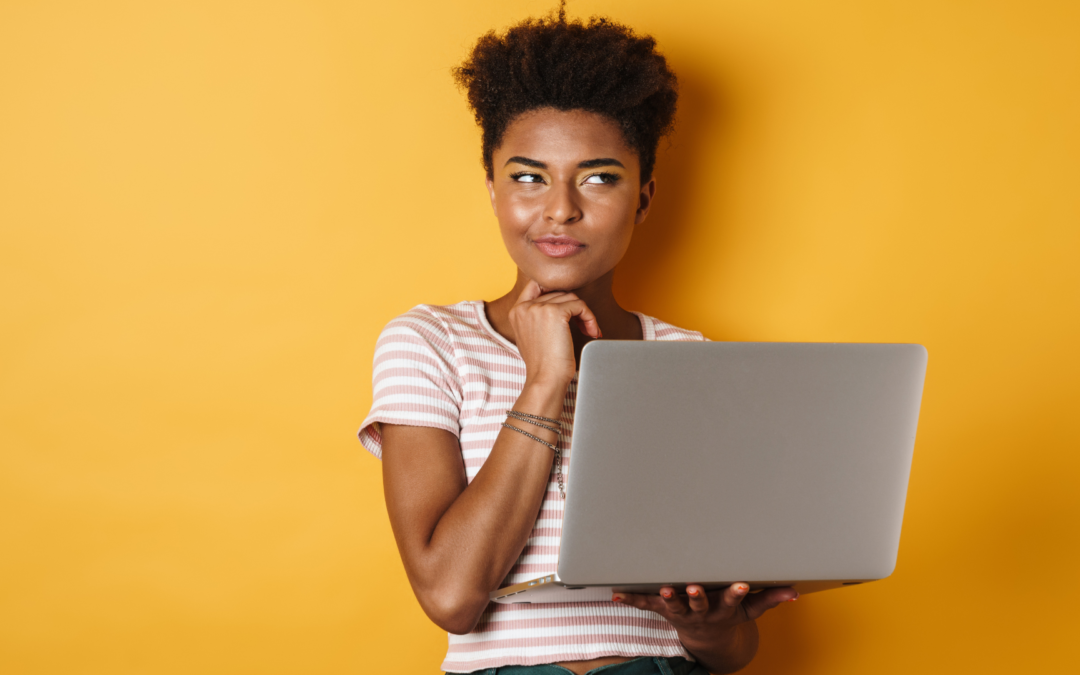 black-woman-thinking-and-using-laptop