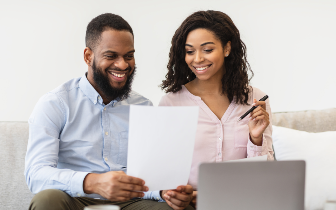 couple-looking-at-life-insurance-document